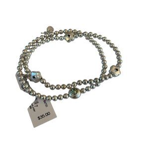 Matte Silver Toned Beaded Stretch Bracelet Set.